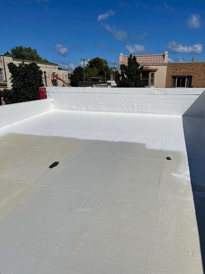 Professional membrane restoration by Roof Tech LLC demonstrating expert application and quality materials for weather protection